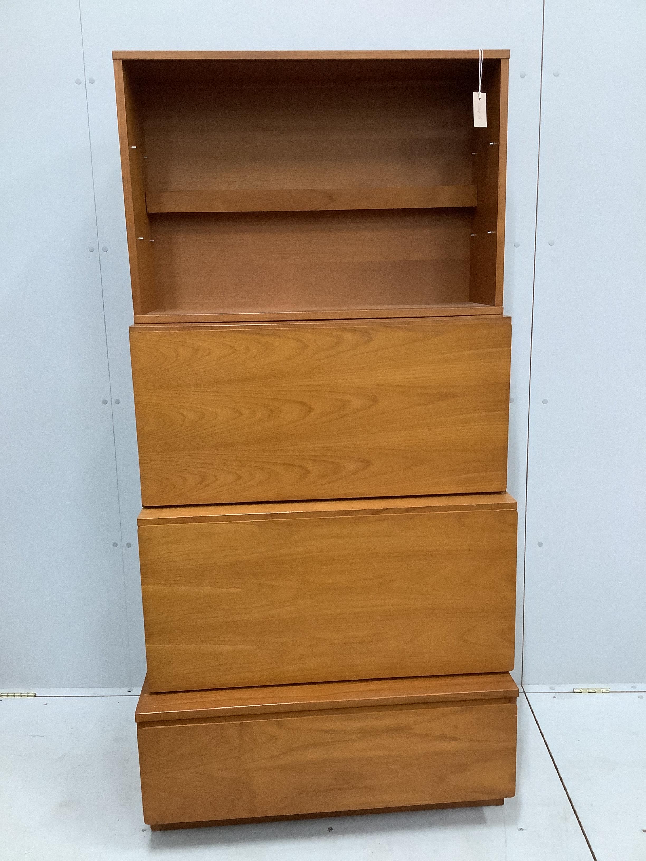 A mid century Beaver and Tapley teak four section ladder wall unit, width 84cm, combined height 173cm